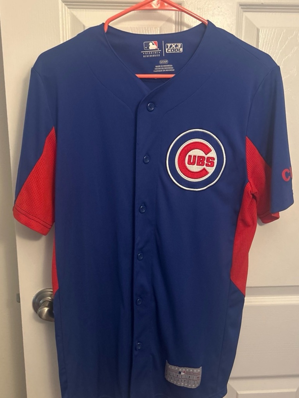 Genuine Merchandise Blue Baseball Jersey with Red and White Accents
